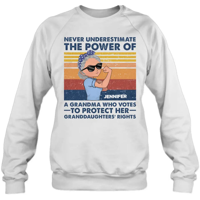 Custom Personalized Grandma Votes T-shirt/ Long Sleeve/ Sweatshirt/ Hoodie - Gift Idea For Grandma - Never Underestimate The Power Of A Grandma Who Votes To Protect Her Granddaughters' Rights